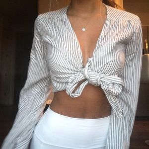 PAIGE striped wraparound top